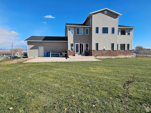660 S 2500 W, Vernal, UT 84078 - back of house featuring a patio area and a yard