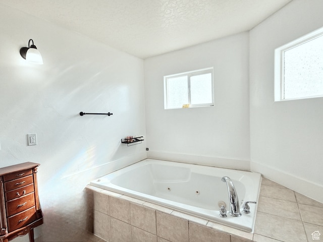660 S 2500 W, Vernal, UT 84078 - bathroom featuring tile patterned flooring, a textured ceiling, and a relaxing tiled tub