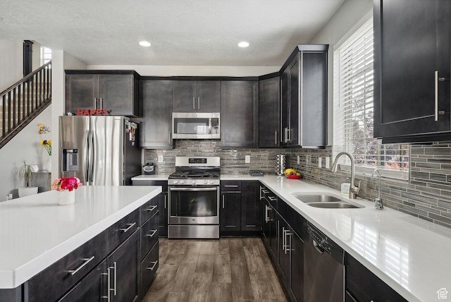 11959 S 235 E, Draper, UT 84020 - kitchen with appliances with stainless steel finishes, a sink, plenty of natural light, dark wood-type flooring, and recessed lighting