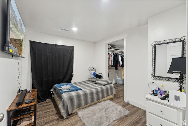 11959 S 235 E, Draper, UT 84020 - bedroom featuring wood finished floors, baseboards, and a walk in closet