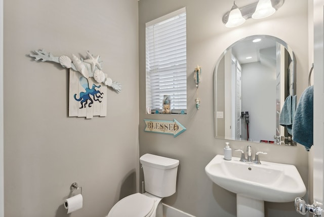 11959 S 235 E, Draper, UT 84020 - bathroom featuring toilet, a sink, and baseboards