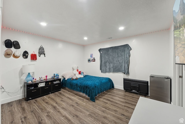 11959 S 235 E, Draper, UT 84020 - bedroom with wood finished floors, baseboards, and recessed lighting