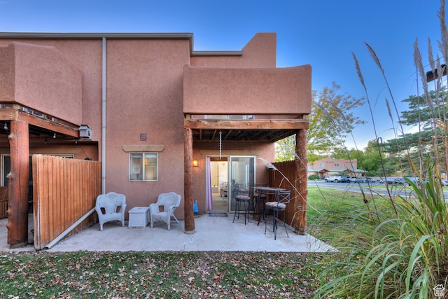 385 E Pueblo Ct, Moab, UT 84532 - rear view of house featuring a patio area