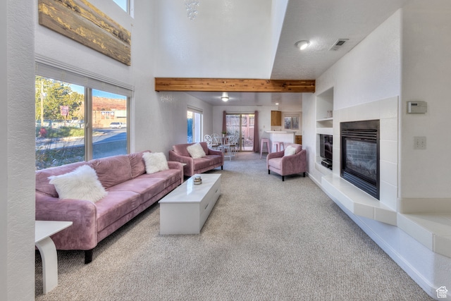 385 E Pueblo Ct, Moab, UT 84532 - living room featuring a fireplace and light colored carpet