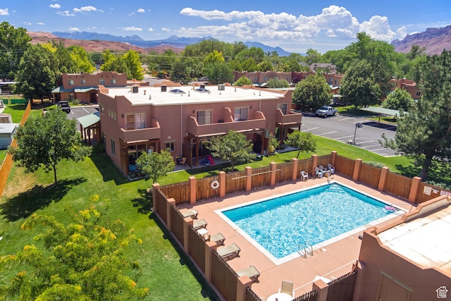 385 E Pueblo Ct, Moab, UT 84532 - view of pool featuring a mountain view and a yard