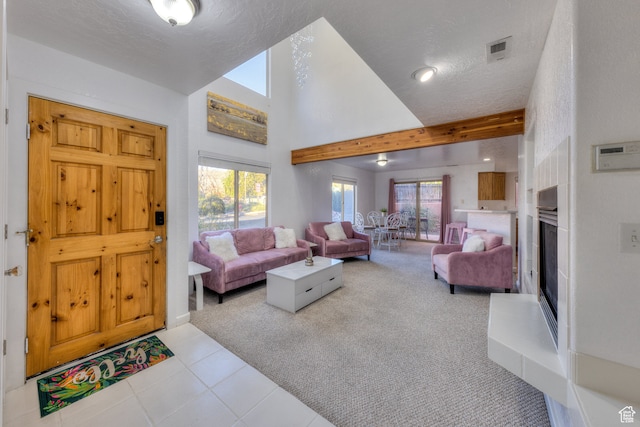 385 E Pueblo Ct, Moab, UT 84532 - living room with a textured ceiling, light carpet, and beam ceiling