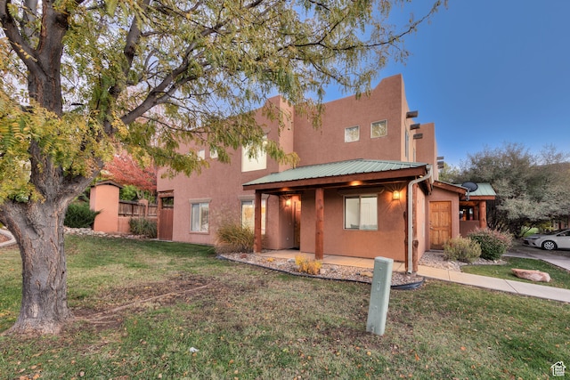 385 E Pueblo Ct, Moab, UT 84532 - view of front of house featuring a front yard