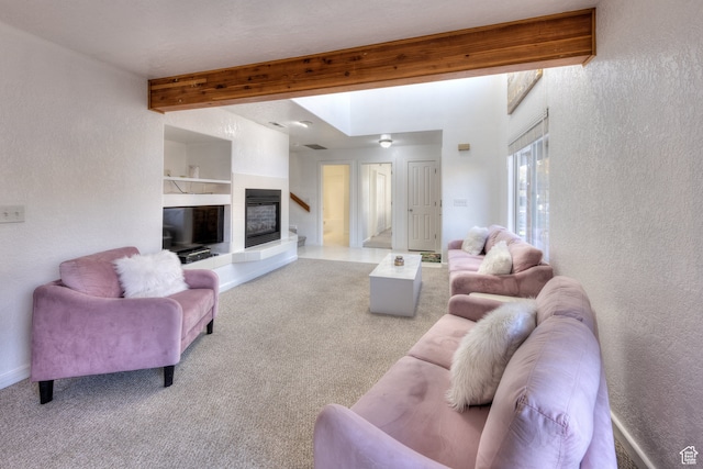 385 E Pueblo Ct, Moab, UT 84532 - carpeted living room with beamed ceiling