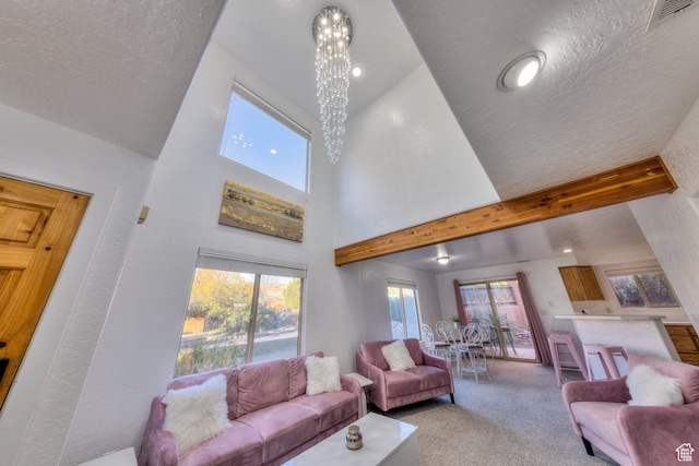385 E Pueblo Ct, Moab, UT 84532 - carpeted living room featuring a textured ceiling, high vaulted ceiling, beamed ceiling, and an inviting chandelier