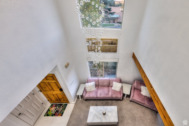 385 E Pueblo Ct, Moab, UT 84532 - carpeted living room featuring a towering ceiling