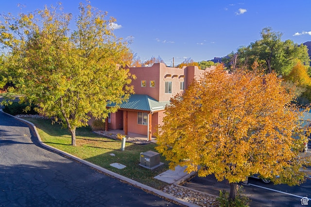 385 E Pueblo Ct, Moab, UT 84532 - view of front of house with a front lawn