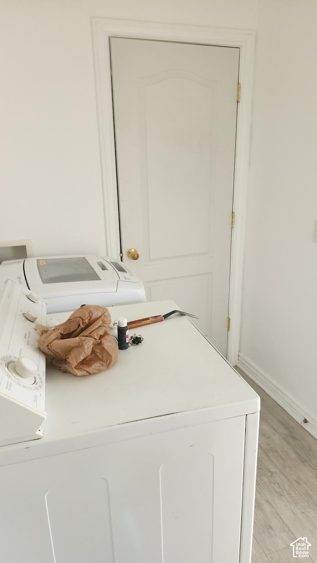 449 N 400 W, Heber City, UT 84032 - clothes washing area featuring washer and clothes dryer and light hardwood / wood-style floors