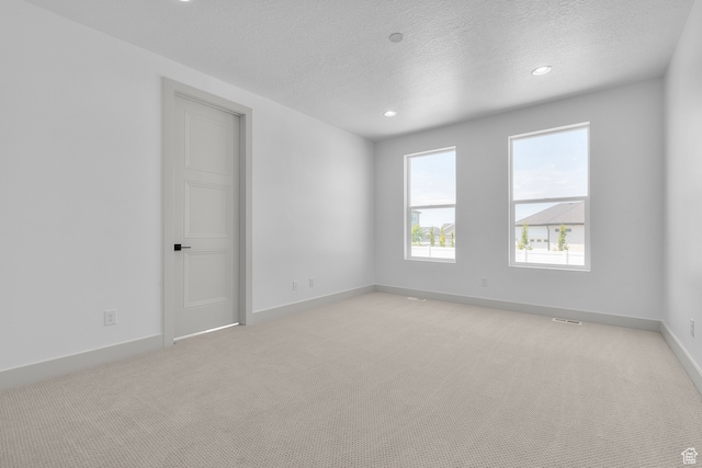 2523 N 3250 W, Clinton, UT 84015 - carpeted spare room featuring a textured ceiling