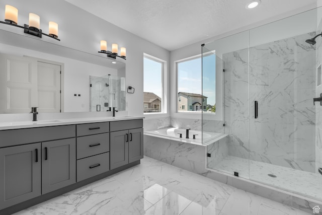 2523 N 3250 W, Clinton, UT 84015 - bathroom with vanity, a textured ceiling, and separate shower and tub
