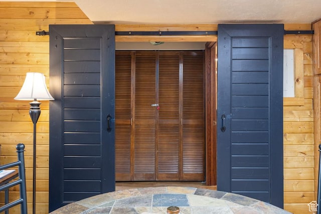 150 W Ridgeview St Unit 220, Brian Head, UT 84719 - foyer featuring wooden walls