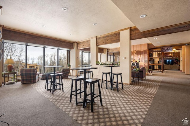 150 W Ridgeview St Unit 220, Brian Head, UT 84719 - carpeted dining space featuring a textured ceiling, plenty of natural light, and recessed lighting