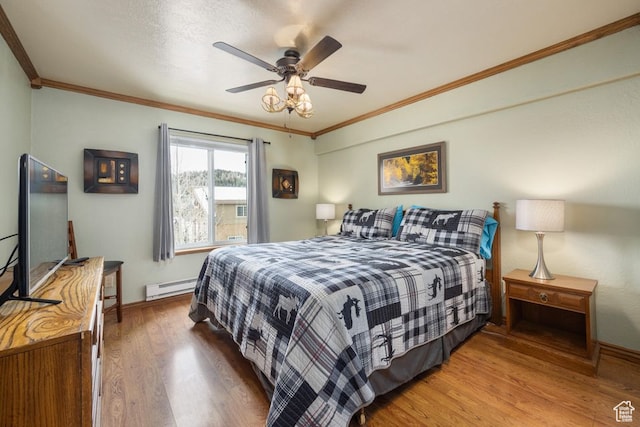 150 W Ridgeview St Unit 220, Brian Head, UT 84719 - bedroom with hardwood / wood-style floors, ceiling fan, a baseboard radiator, and crown molding