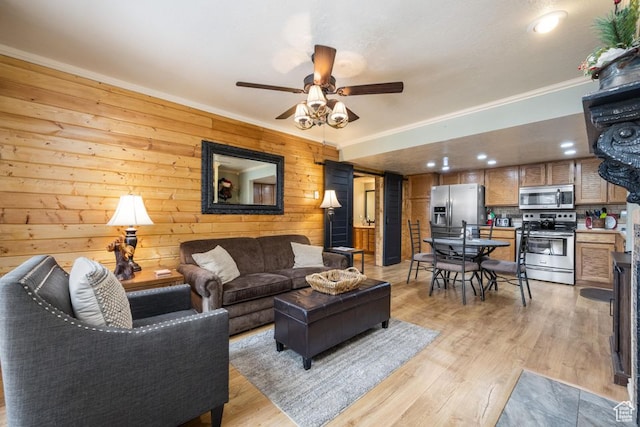 150 W Ridgeview St Unit 220, Brian Head, UT 84719 - living room with wood walls, ceiling fan, light wood-type flooring, and ornamental molding