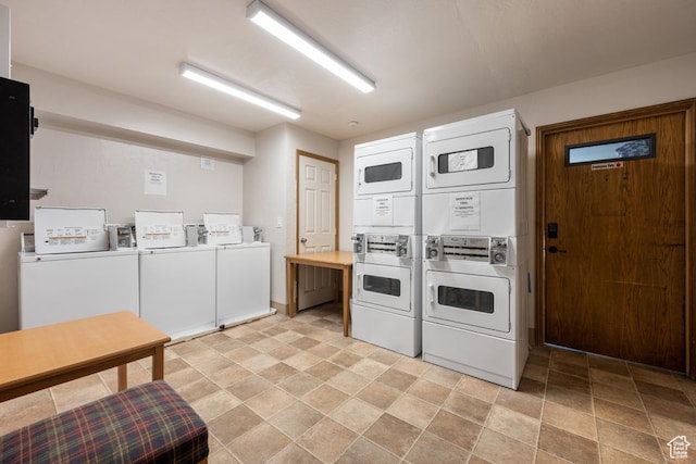 150 W Ridgeview St Unit 220, Brian Head, UT 84719 - clothes washing area featuring stacked washer and clothes dryer and washing machine and dryer