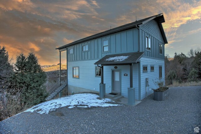 1400 N Cisco Cir, Garden City, UT 84028 - view of front of home featuring board and batten siding