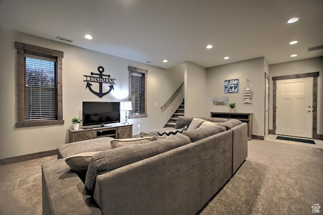 1400 N Cisco Cir, Garden City, UT 84028 - living room featuring stairs, baseboards, recessed lighting, and light colored carpet