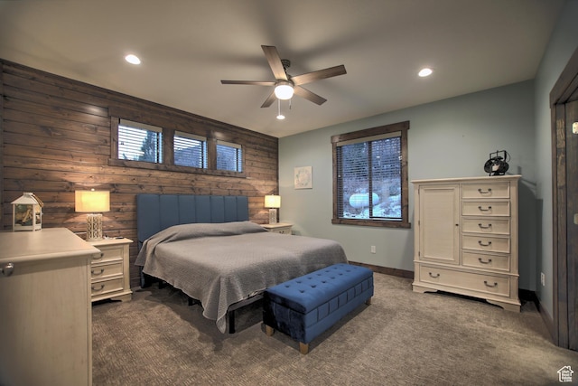 1400 N Cisco Cir, Garden City, UT 84028 - bedroom with wooden walls, dark colored carpet, recessed lighting, baseboards, and a ceiling fan