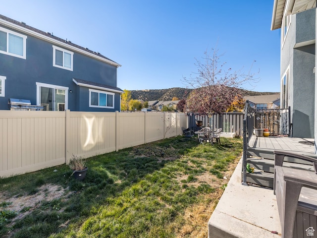 4182 E Paddock Way, Eagle Mountain, UT 84005 - view of yard featuring a deck