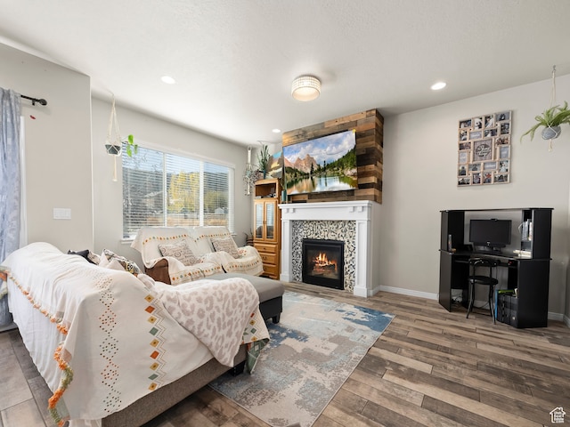 4182 E Paddock Way, Eagle Mountain, UT 84005 - living room featuring hardwood / wood-style floors and a tile fireplace