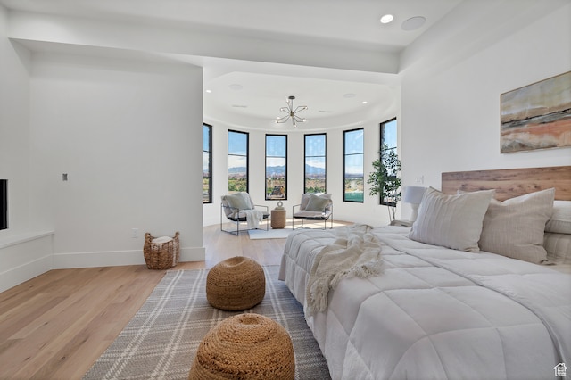 3967 N Hillside Way, Santa Clara, UT 84765 - bedroom featuring a notable chandelier and light hardwood / wood-style floors