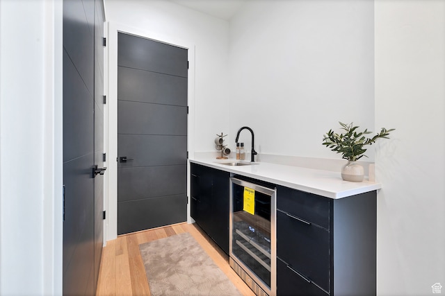 3967 N Hillside Way, Santa Clara, UT 84765 - bar with light hardwood / wood-style flooring, sink, and beverage cooler