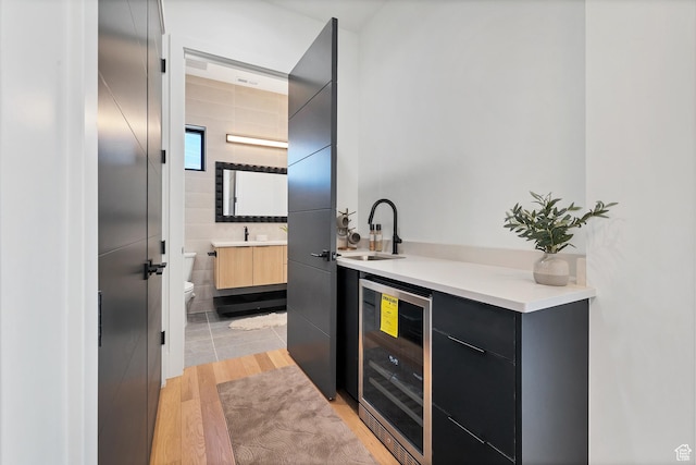 3967 N Hillside Way, Santa Clara, UT 84765 - bathroom with beverage cooler, toilet, vanity, and wood finished floors