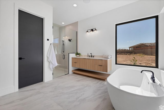 3967 N Hillside Way, Santa Clara, UT 84765 - full bath with a shower stall, a soaking tub, vanity, recessed lighting, and marble look tiles