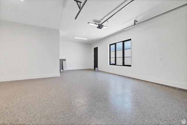 3967 N Hillside Way, Santa Clara, UT 84765 - garage featuring baseboards and a garage door opener
