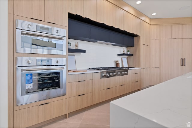 3967 N Hillside Way, Santa Clara, UT 84765 - kitchen with light brown cabinets, appliances with stainless steel finishes, backsplash, and light tile patterned flooring