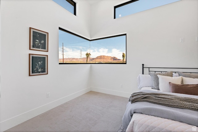 3967 N Hillside Way, Santa Clara, UT 84765 - carpeted bedroom with baseboards and a high ceiling