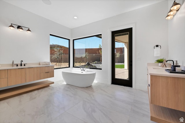 3967 N Hillside Way, Santa Clara, UT 84765 - bathroom with two vanities and a freestanding tub