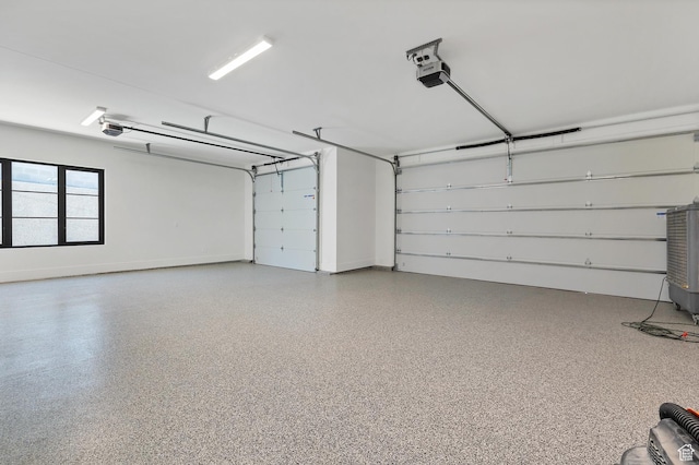 3967 N Hillside Way, Santa Clara, UT 84765 - garage with a garage door opener and baseboards