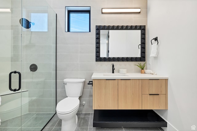 3967 N Hillside Way, Santa Clara, UT 84765 - bathroom with vanity, walk in shower, tile patterned floors, and tile walls