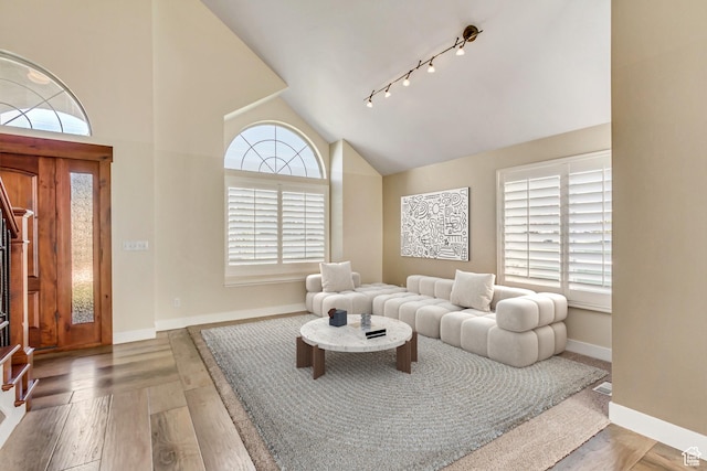 158 E Shepard Ln, Kaysville, UT 84037 - living room featuring hardwood / wood-style flooring, high vaulted ceiling, and plenty of natural light