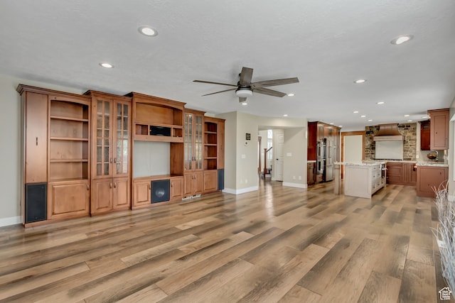 158 E Shepard Ln, Kaysville, UT 84037 - unfurnished living room with light hardwood / wood-style flooring and ceiling fan
