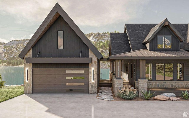 1478 S 920 E, Salem, UT 84653 - view of front facade with a standing seam roof, a metal roof, a garage, driveway, and stone siding