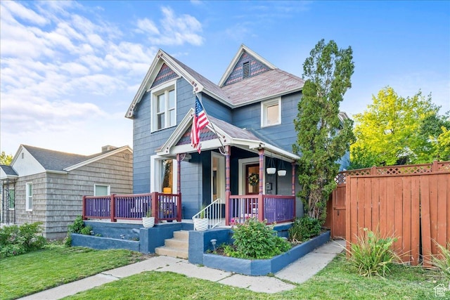 673 E 7th Ave, Salt Lake City, UT 84103 - victorian home with a porch