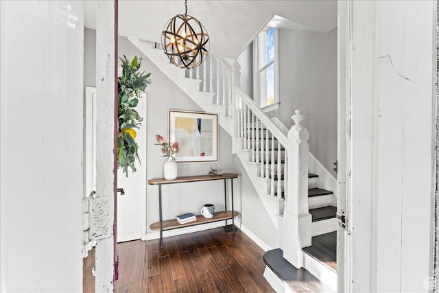 673 E 7th Ave, Salt Lake City, UT 84103 - stairs featuring wood finished floors, a chandelier, and baseboards