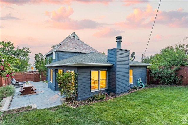 673 E 7th Ave, Salt Lake City, UT 84103 - rear view of house with a patio, a chimney, a shingled roof, and an outdoor living space