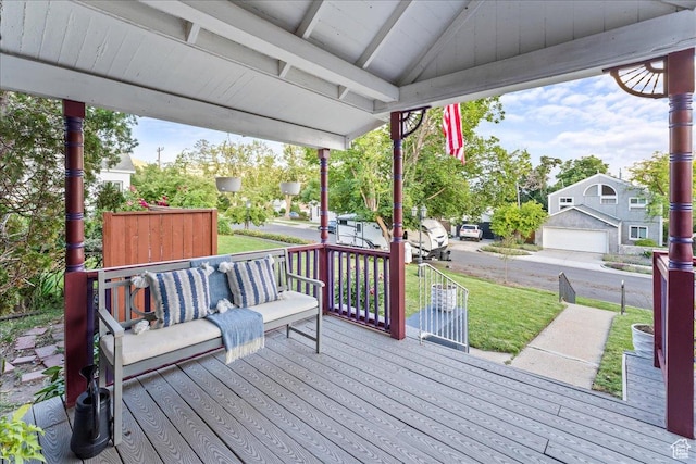 673 E 7th Ave, Salt Lake City, UT 84103 - wooden deck with a lawn, an outdoor living space, and a porch