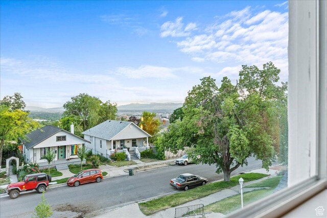 673 E 7th Ave, Salt Lake City, UT 84103 - view of asphalt street featuring sidewalks, a mountain view, and curbs