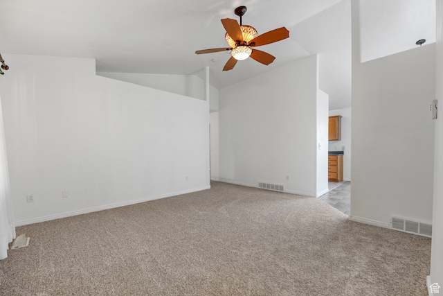 unfurnished living room featuring high vaulted ceiling, light colored carpet, and ceiling fan