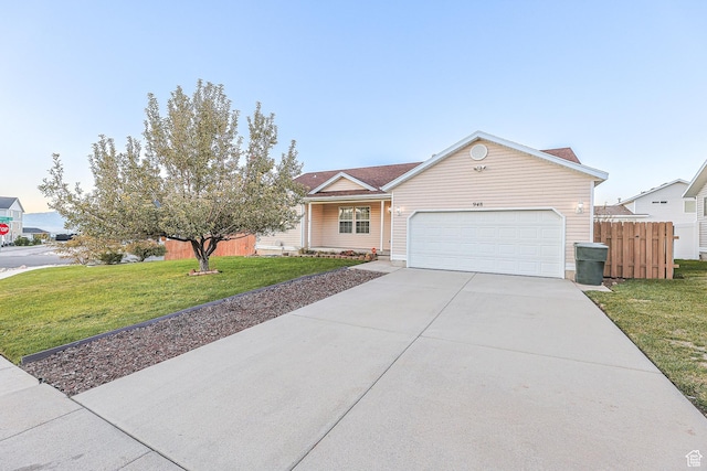 948 W 540th St S, Tooele, UT 84074 - view of front of property featuring a garage and concrete driveway