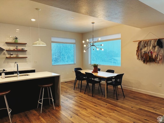 15224 S Tall Woods Dr, Draper Ut Cnty, UT 84020 - dining space featuring baseboards, dark wood-style flooring, healthy amount of natural light, a chandelier, and recessed lighting