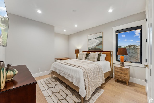 3300 E Hunters Ridge Cir, Heber City, UT 84032 - bedroom featuring light wood finished floors, baseboards, and recessed lighting